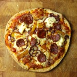 Caramelised onion, chorizo, mascarpone and roast pepper pizza